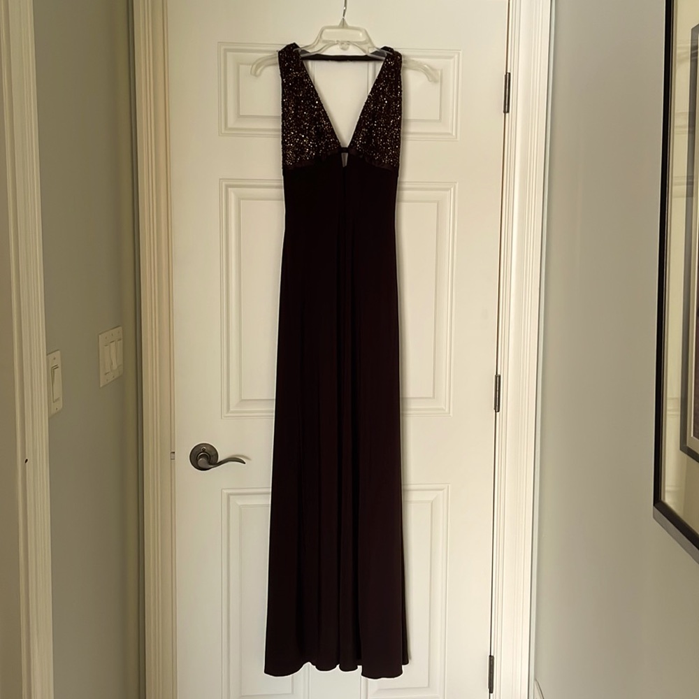 Full length halter dress. Size 4 Chocolate brown with copper beading on top.